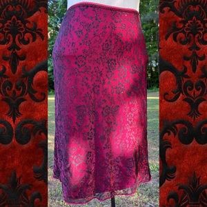 90’s-Y2K red & black metallic midi skirt.
